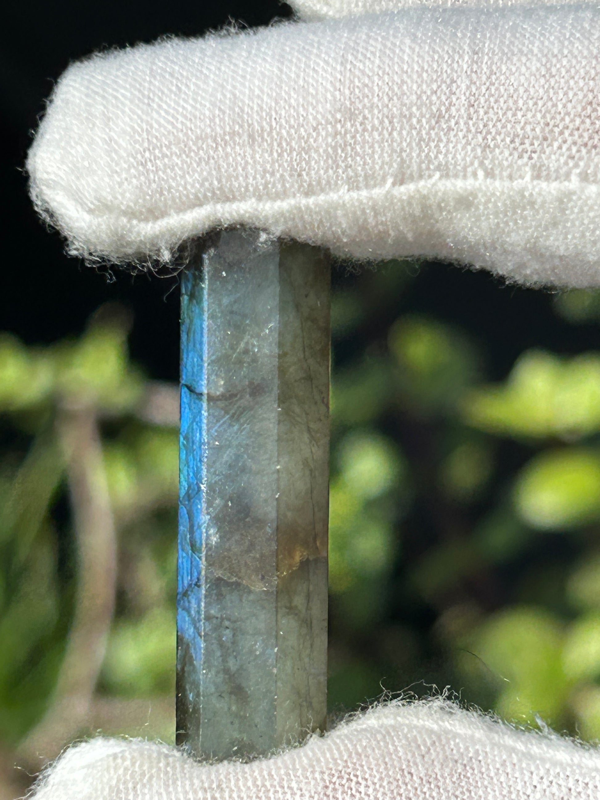 Labradorite point with blue flash