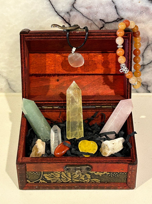 Confidence boosting treasure chest with a variety of crystals and jewellery