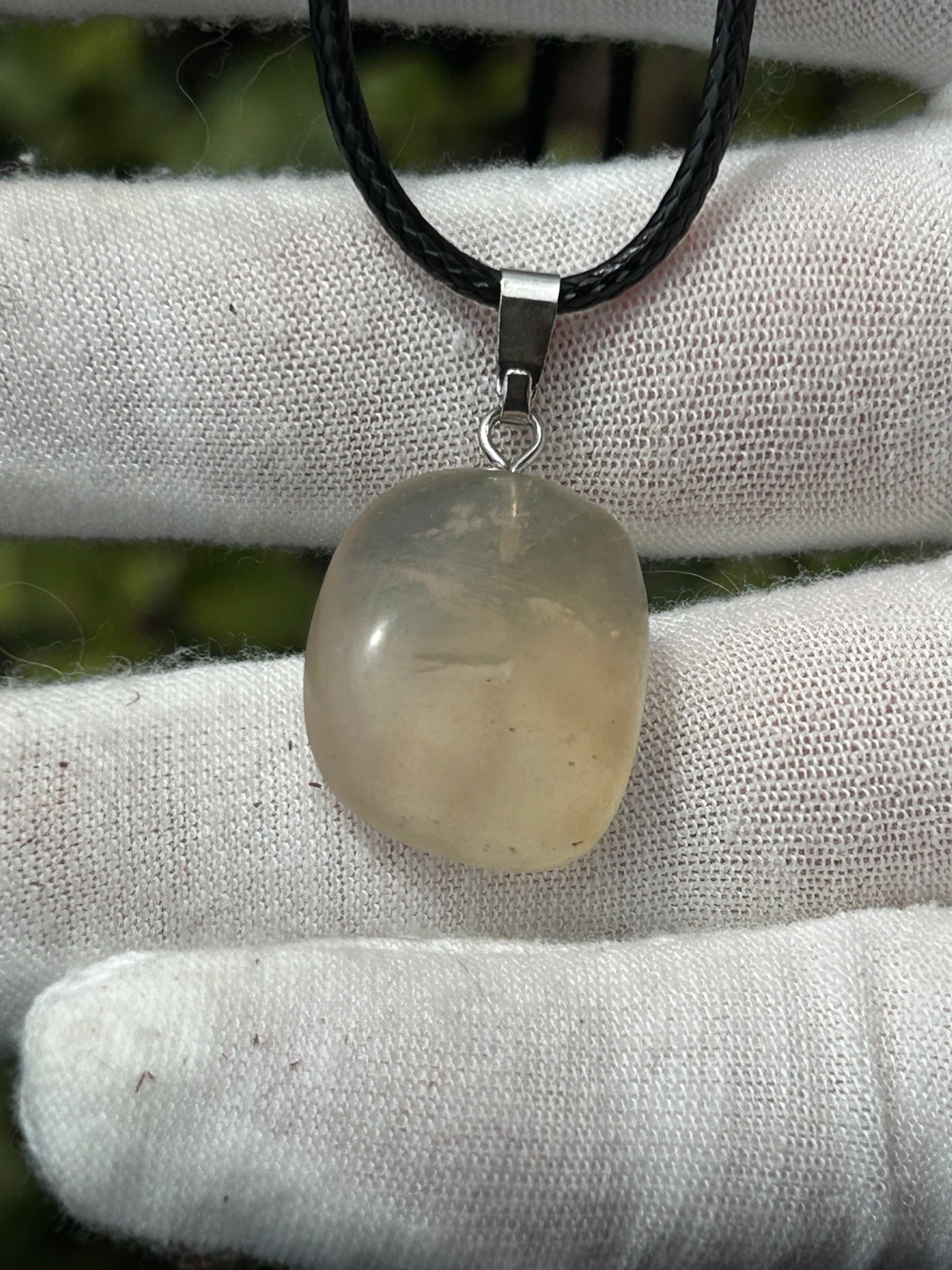 Rainbow fluorite pendant with black cord necklace