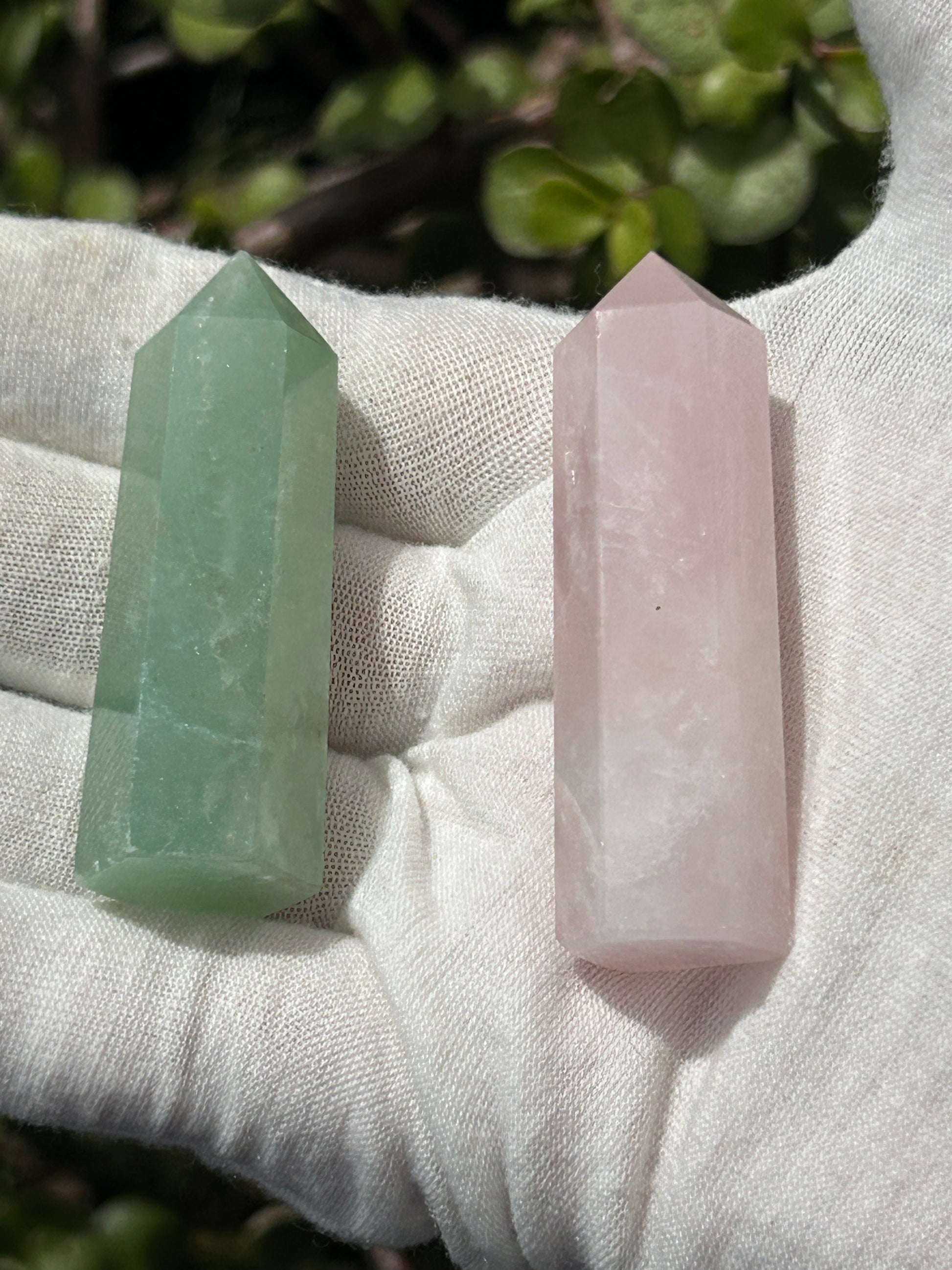 Green aventurine point and rose quartz crystal point