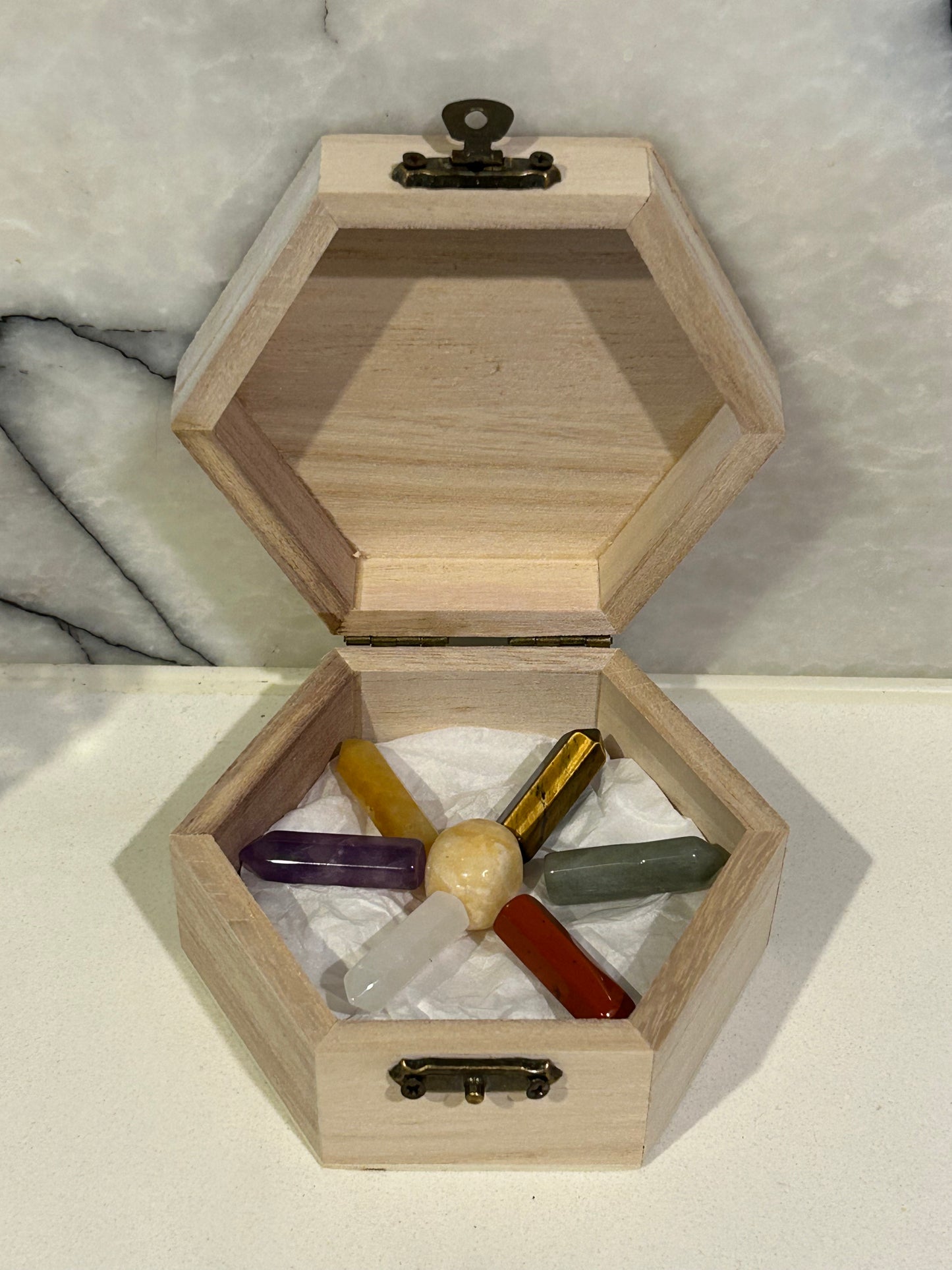 Wooden box containing mixed crystals