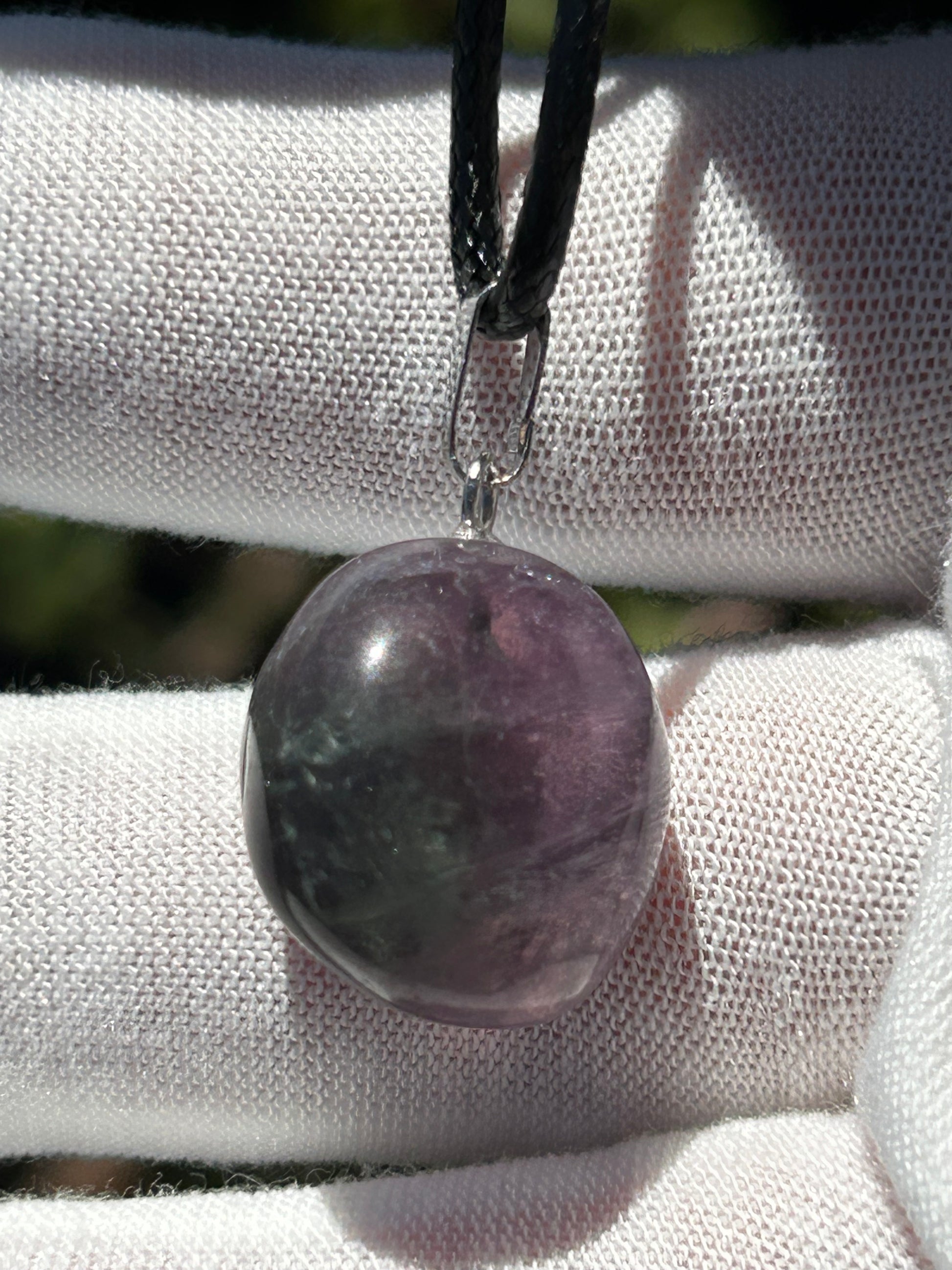 Rainbow fluorite polished pendant