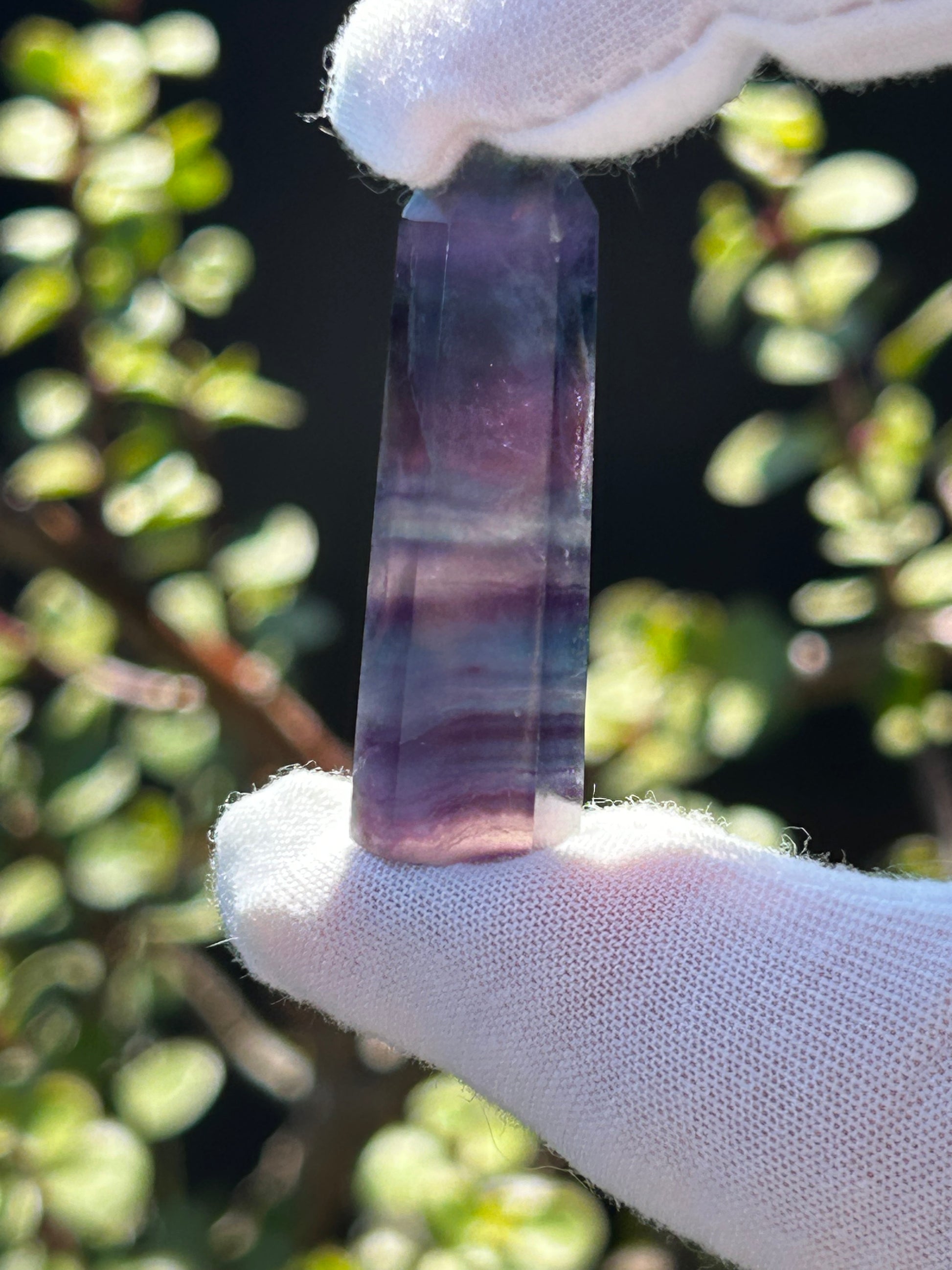 Rainbow fluorite crystal point