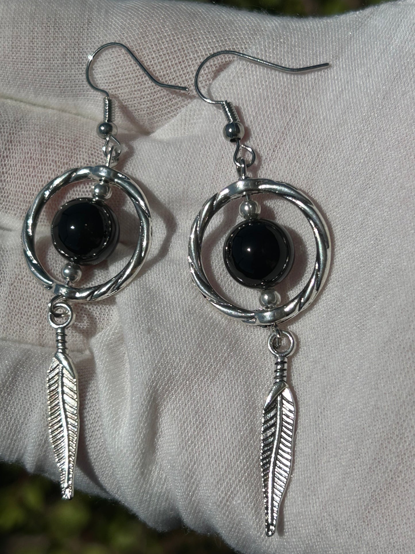 Black Onyx Drop earrings set in silver feather design