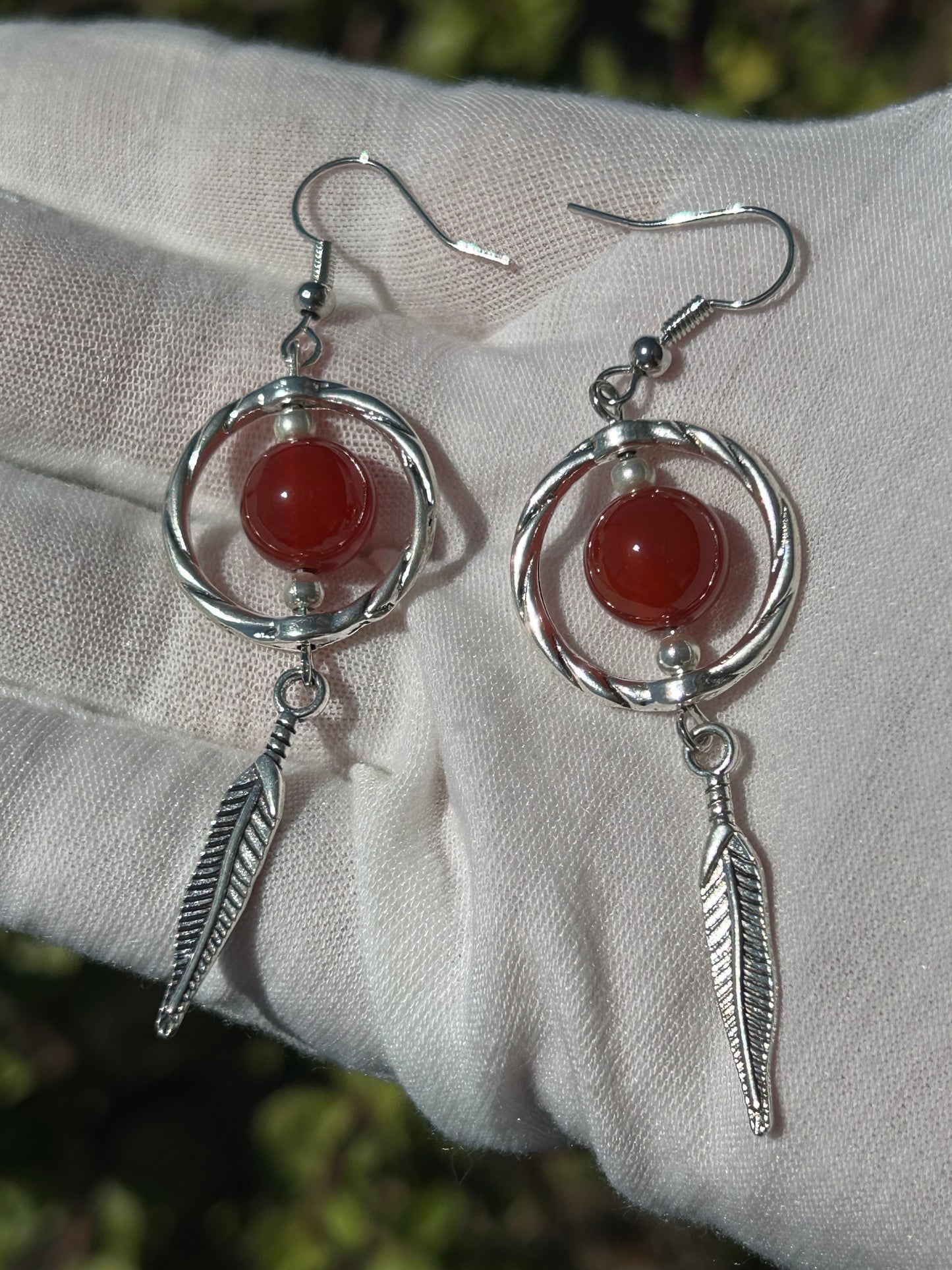 Carnelian Drop Earrings in silver setting with feather design