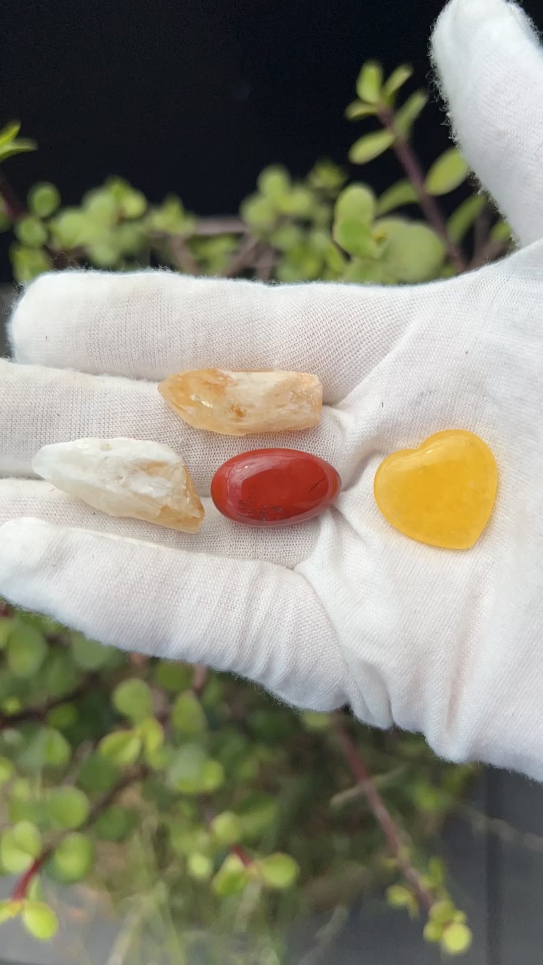 2 citrine crystal shards, red jasper polished stone, and yellow jade polished heart